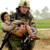 iraq soldier carrying baby